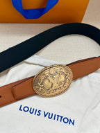 Brown and navy leather belt with silver-tone oval logo buckle
