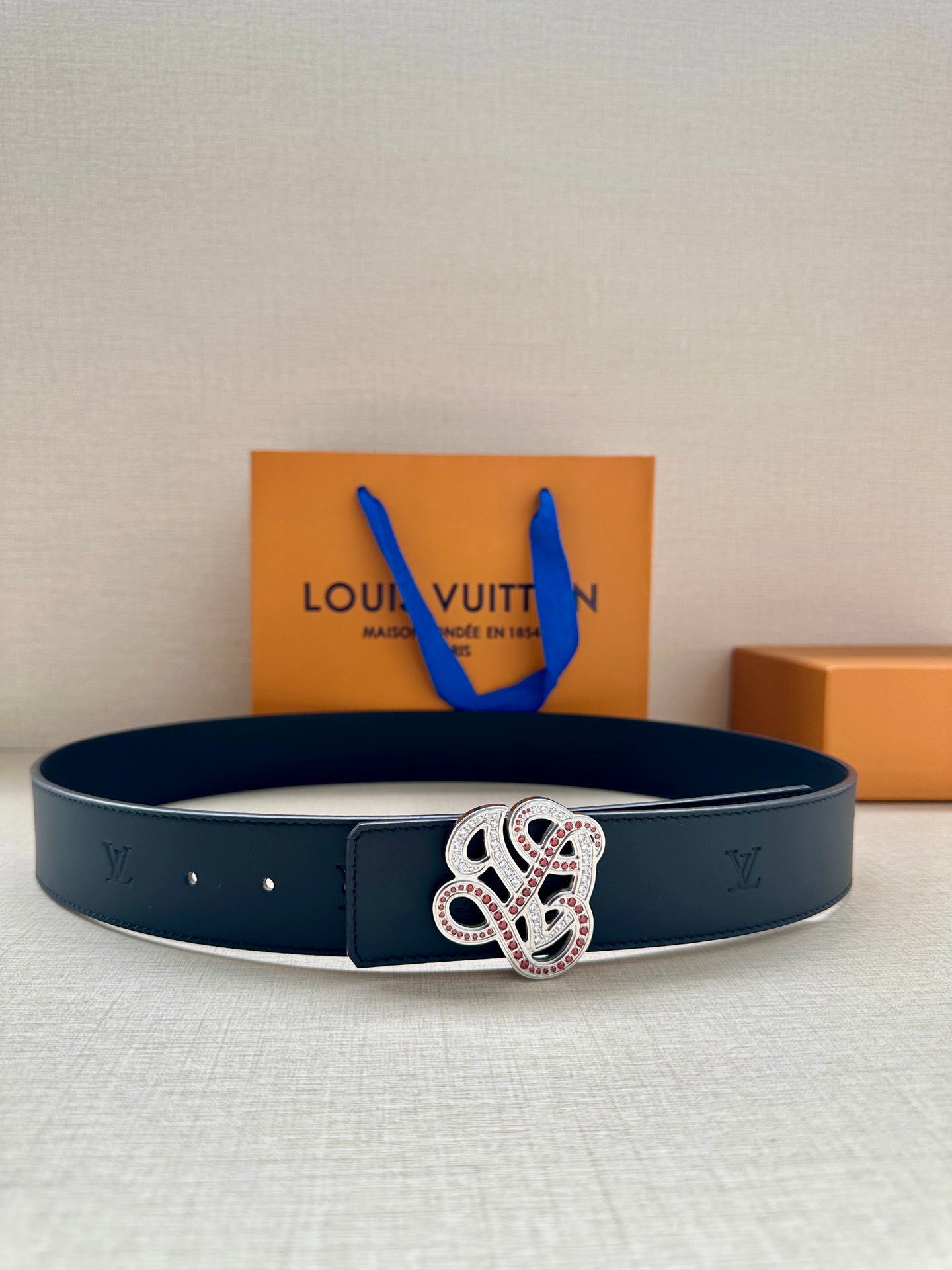 Louis Vuitton dark blue leather belt with rhinestone monogram buckle