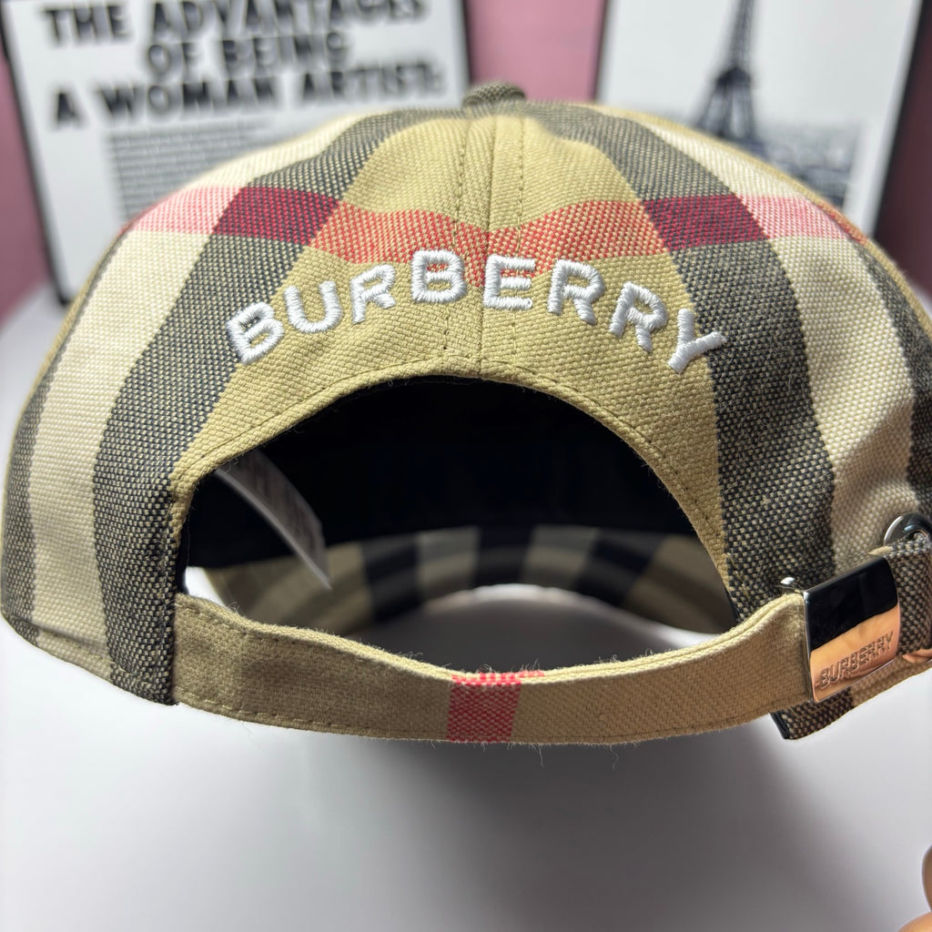 Burberry baseball cap with embroidered BURBERRY text on yellow plaid underside
