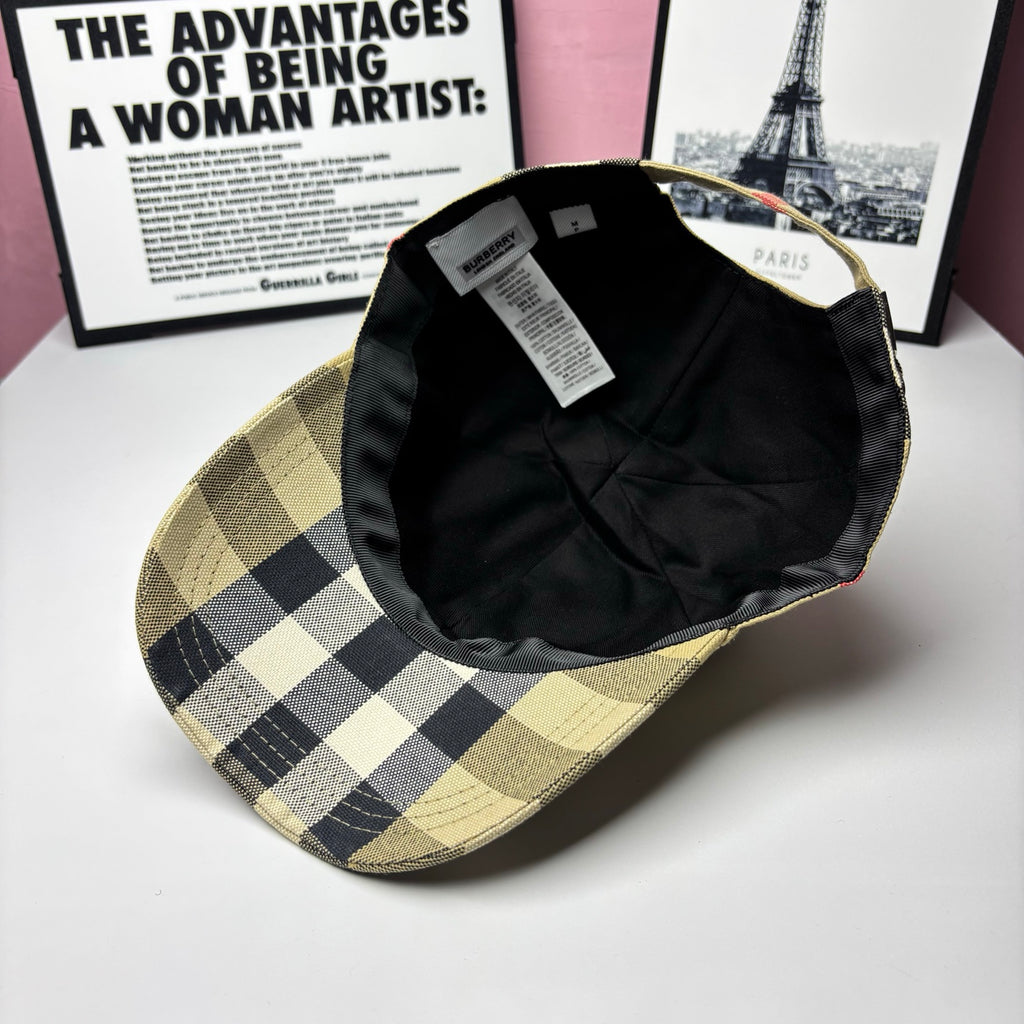 Burberry cap interior view showing dark lining and adjustable strap inside
