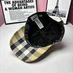 Burberry cap interior view showing dark lining and adjustable strap inside
