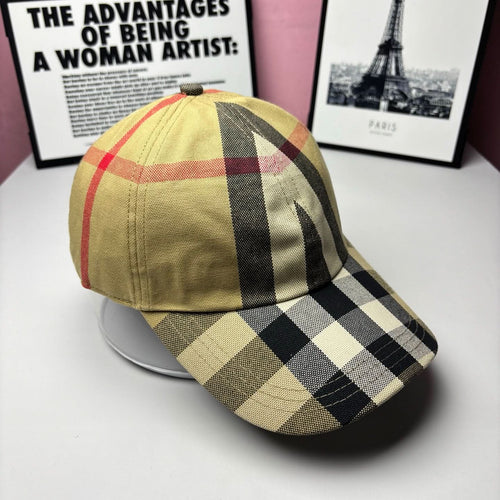 Burberry baseball cap, side view, yellow plaid with black and red tones