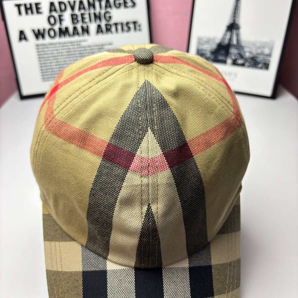 Burberry baseball cap top view, yellow plaid with red and black stripe bands