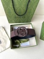 Brown leather belt with silver-tone interlocking G buckle in open gift box