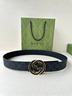 Gucci belt in dark monogram leather with round gold-tone double G buckle