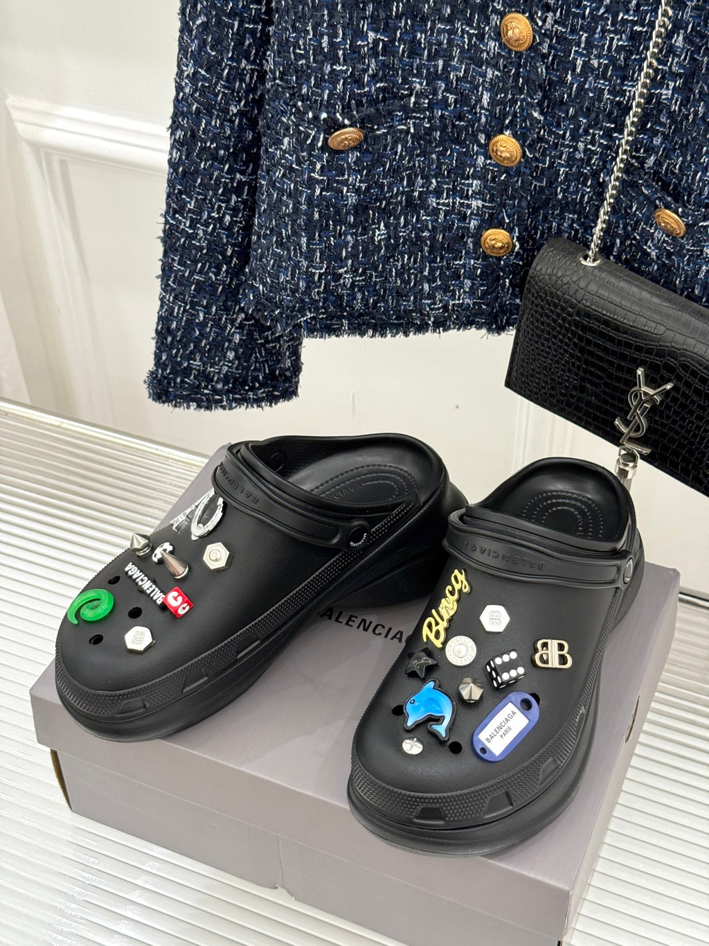 Balenciaga black slip-on clogs with colorful studded decorations, side view