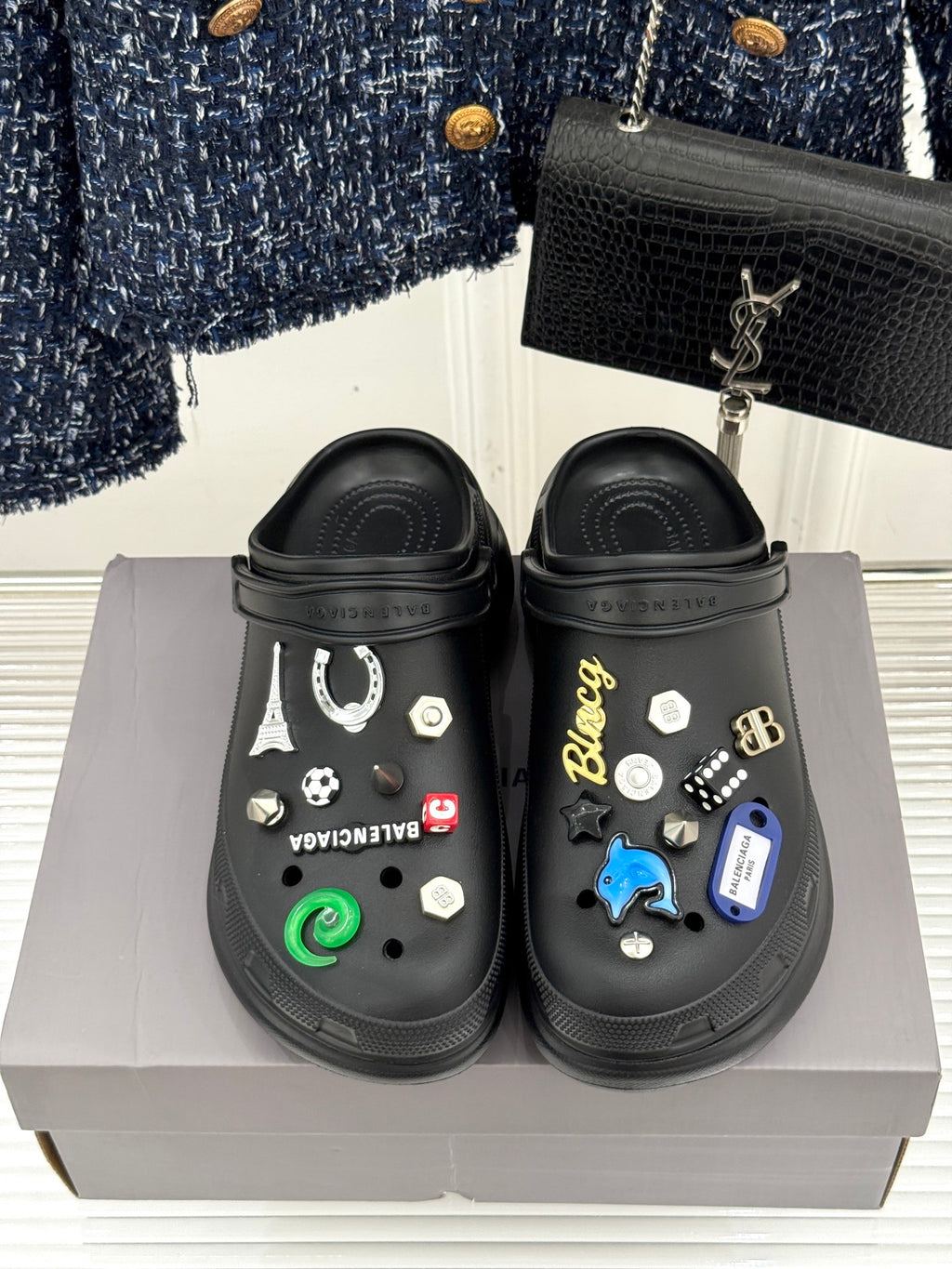 Balenciaga black slip-on clogs with front studded charms, pair on box