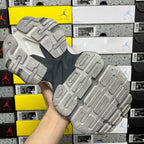 Gray Balenciaga sneaker outsole tread, raised rubber pods with traction pattern