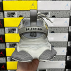 Gray Balenciaga sneaker heel with BALENCIAGA and 40 marking, padded collar