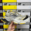 Balenciaga unisex sneakers, light gray with yellow accents, lace-up, black tread outsole