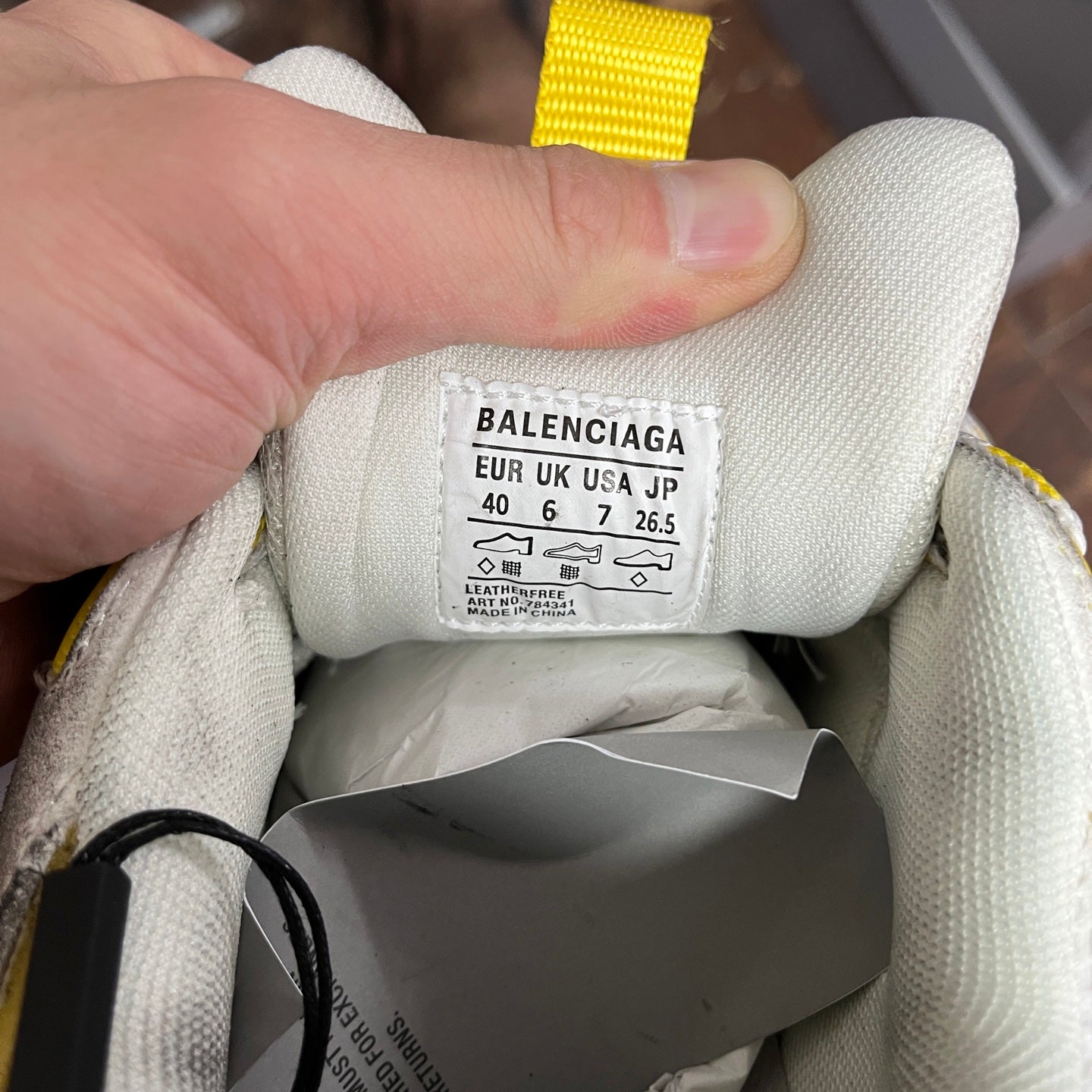 Balenciaga unisex sneaker size label inside, light gray knit collar with yellow strap