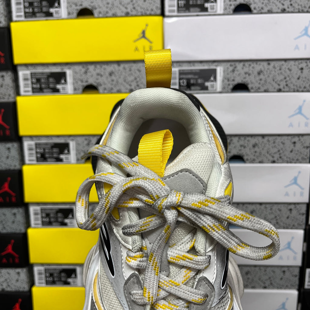 Balenciaga unisex sneakers tongue view, light gray mesh with yellow pull tab and laces