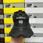 Black sneakers heel with BALENCIAGA text and large 40 size marking