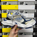 White, blue and gold lace-up sneakers with chunky midsole and sporty design