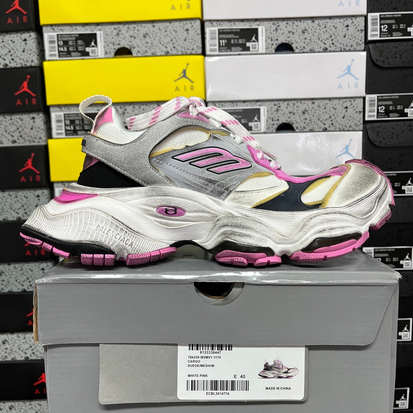 Silver, white, and pink lace-up chunky sneaker with layered side panels
