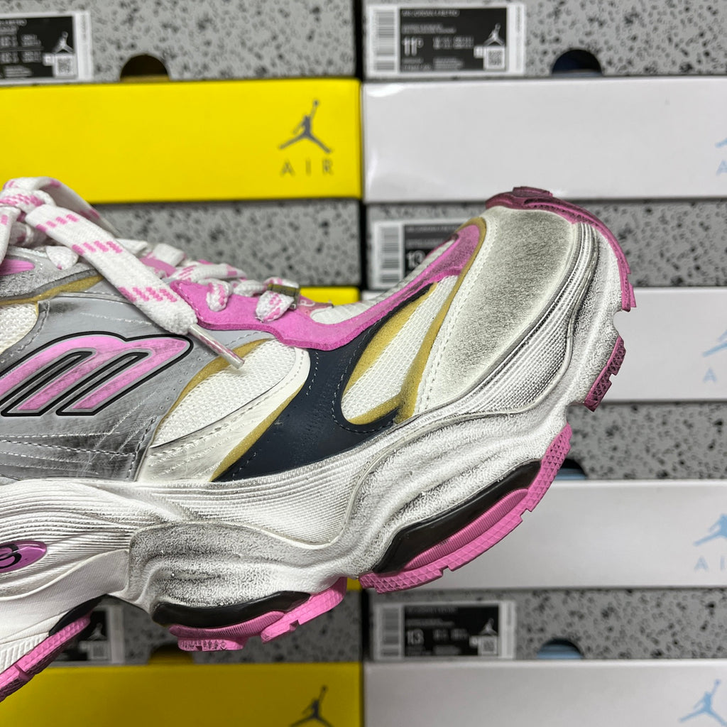 Side view of silver and pink chunky sneaker with cushioned sole