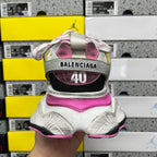 Heel view of silver and pink sneaker with BALENCIAGA logo and size 40