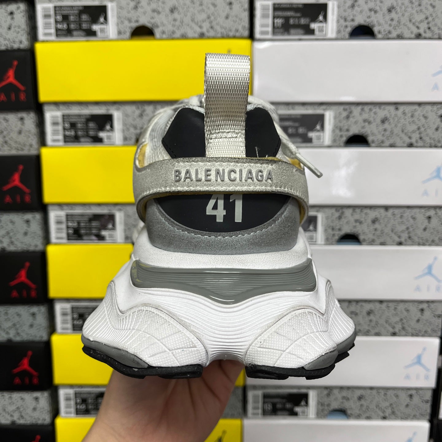 Balenciaga unisex sneakers, heel view with black collar text and white tread outsole