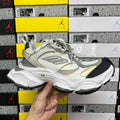 Balenciaga unisex sneakers in white and light gray with yellow accents and black outsole