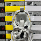 Balenciaga unisex sneakers, back view in white and gray with lace-up closure and yellow edge