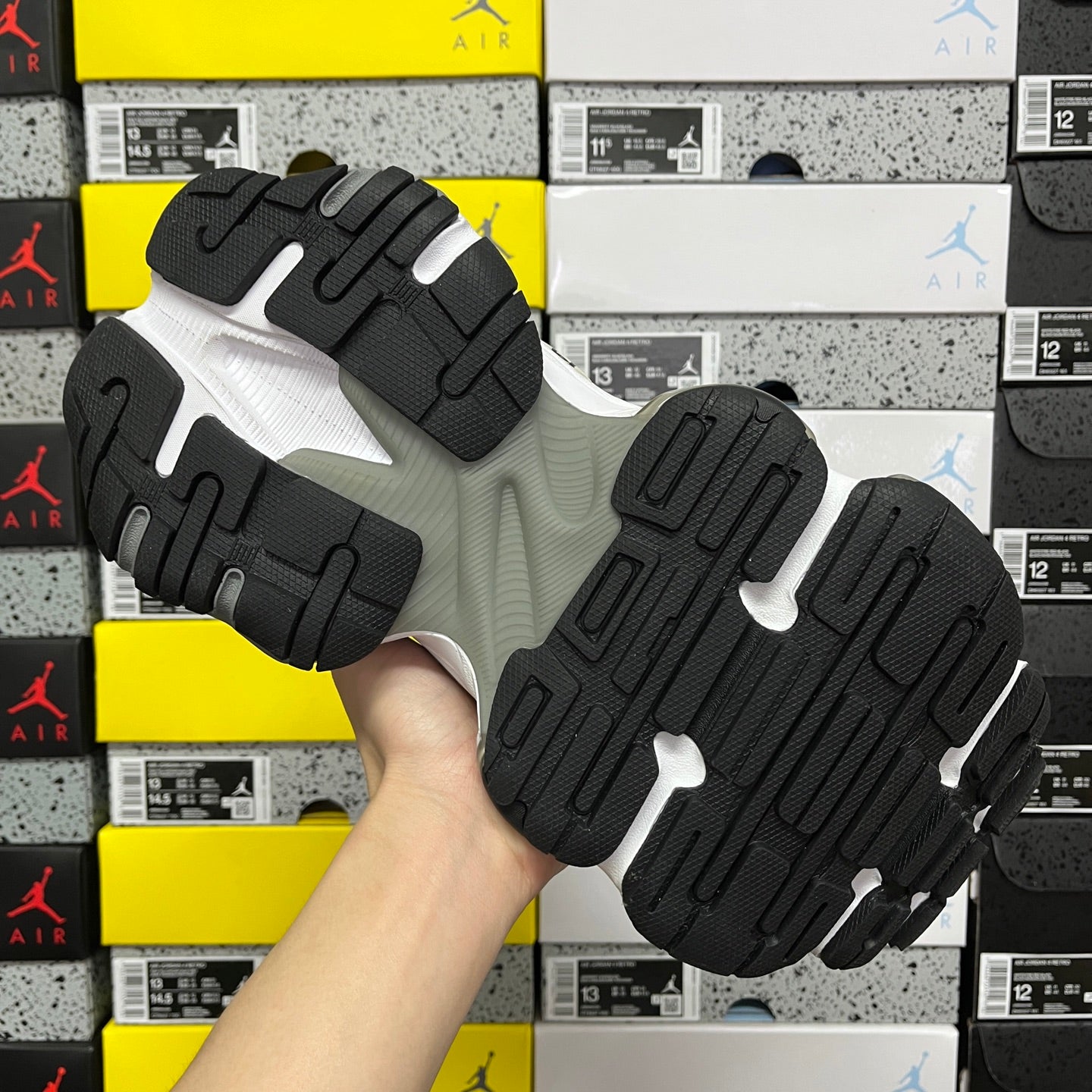 Balenciaga unisex sneakers, outsole view showing black tread with white midsoles