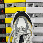Balenciaga unisex sneakers, front view in white mesh with gray lining and yellow accent