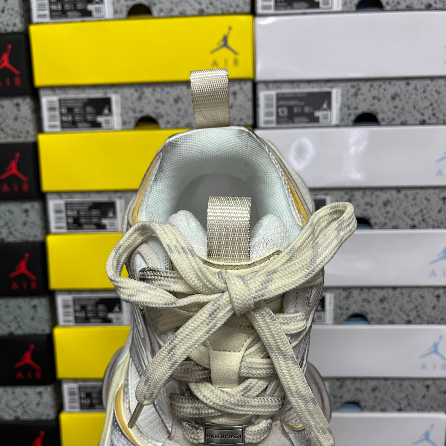 Balenciaga unisex sneakers, metallic silver tongue and lace-up collar view