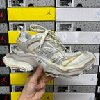 Balenciaga unisex sneakers, metallic silver and gold accented side view
