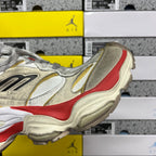 Balenciaga Air sneaker heel side, metallic silver with red stripe and beige sole
