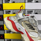 Balenciaga Air sneaker quarter view, metallic silver and beige with red side panel