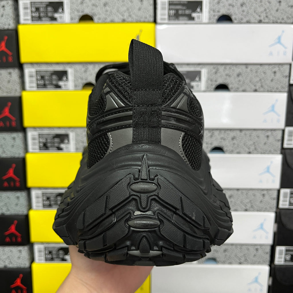 Black Balenciaga unisex sneaker sole, heel tread view with deep rubber traction
