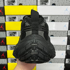 Black Balenciaga unisex sneaker sole, heel tread view with deep rubber traction