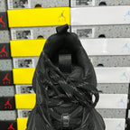 Black Balenciaga unisex sneaker, heel and side view with lace-up upper and padded collar