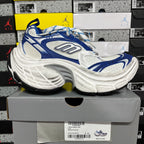Balenciaga unisex sneakers, blue and white side profile with logo detailing and lace-up