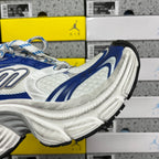 Balenciaga unisex sneakers side view in blue and white with sculpted ribbed midsole