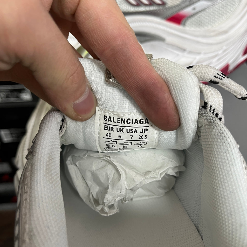 BALENCIAGA size label inside white sneaker, reads EUR UK USA JP 40 6 7 26.5
