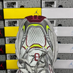 Silver sneaker tongue and collar with burgundy lining and neon green trim
