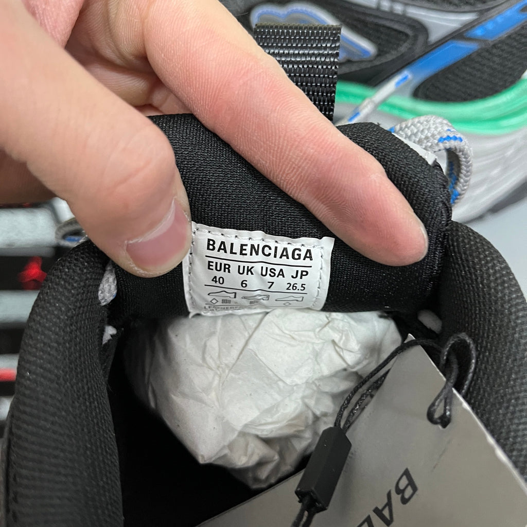 Shoe size label inside black sneaker: BALENCIAGA, EUR/UK/USA/JP sizes