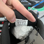 Shoe size label inside black sneaker: BALENCIAGA, EUR/UK/USA/JP sizes