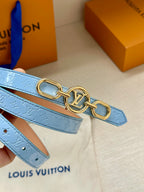 Light blue leather belt with embossed logo texture and gold LV buckle.