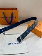 Louis Vuitton belt with navy monogram strap and gold buckle with dust bag