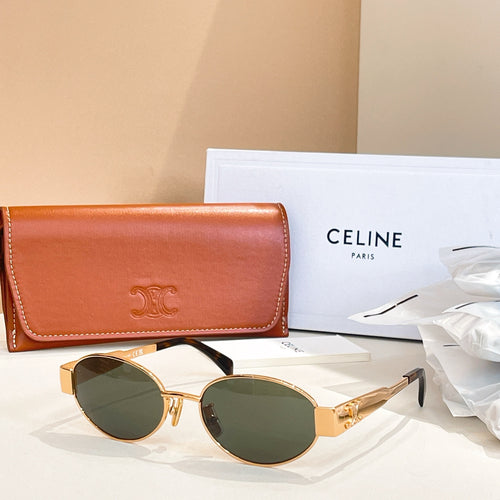 Gold-tone sunglasses with dark green round lenses and curved temple arms