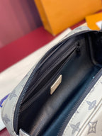 Louis Vuitton monogram toiletry bag close-up of navy zipper and dark leather lining