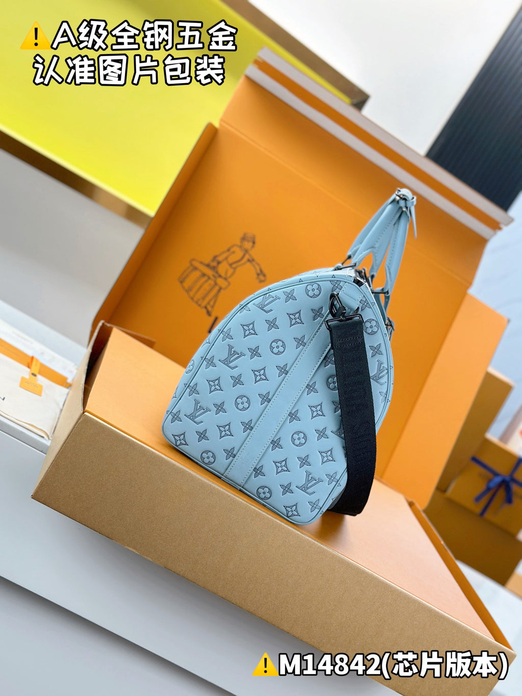 Light-blue Louis Vuitton monogram duffel bag with zipper top and side strap