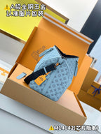Light-blue Louis Vuitton monogram duffel bag with dangling tags and strap