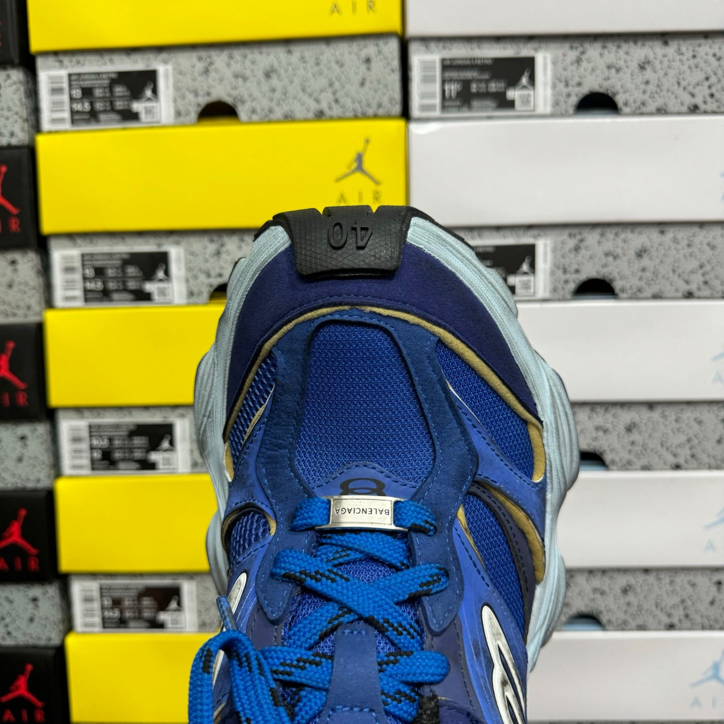 Balenciaga lace-up sneakers, top view of blue tongue and laces with size label