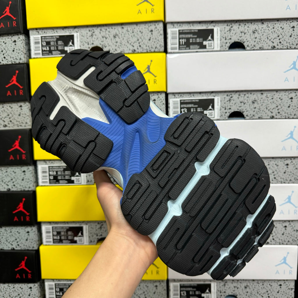 Balenciaga sneakers outsole view, black tread with light blue sole edge
