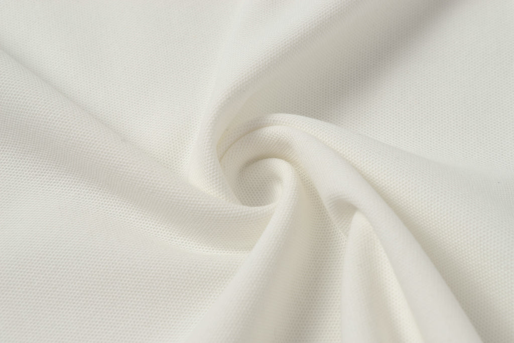 White polo shirt fabric texture close-up