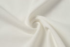 White polo shirt fabric texture close-up