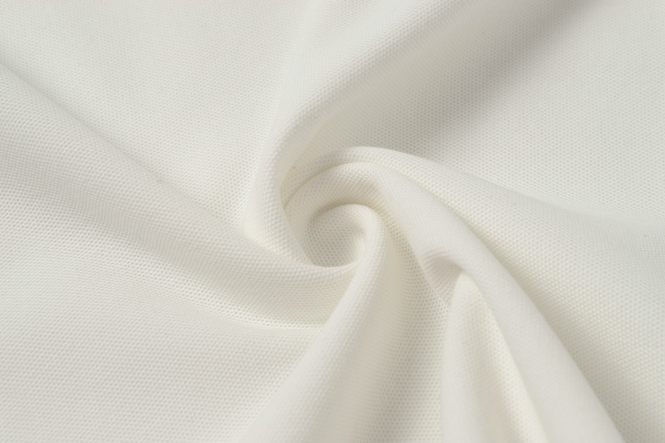 White polo shirt fabric texture close-up